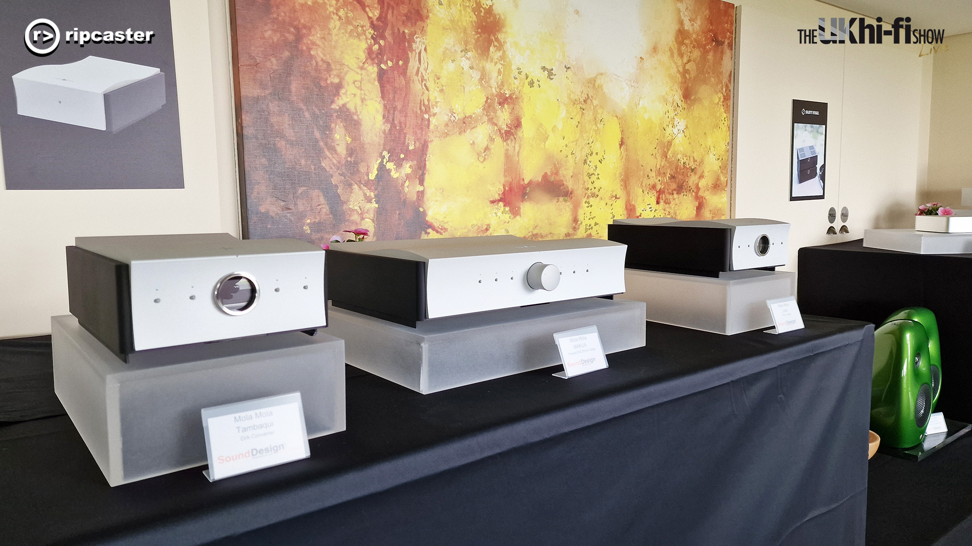 silver HiFi units on a table