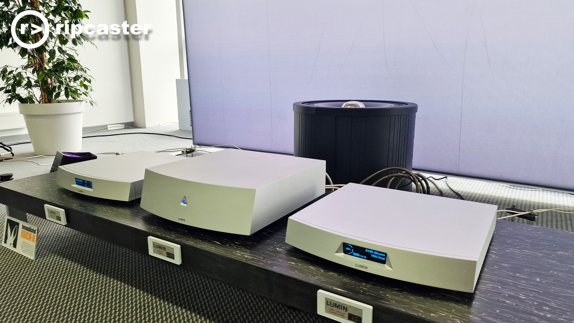 Three Lumin HiFi boxes lined up next to each other