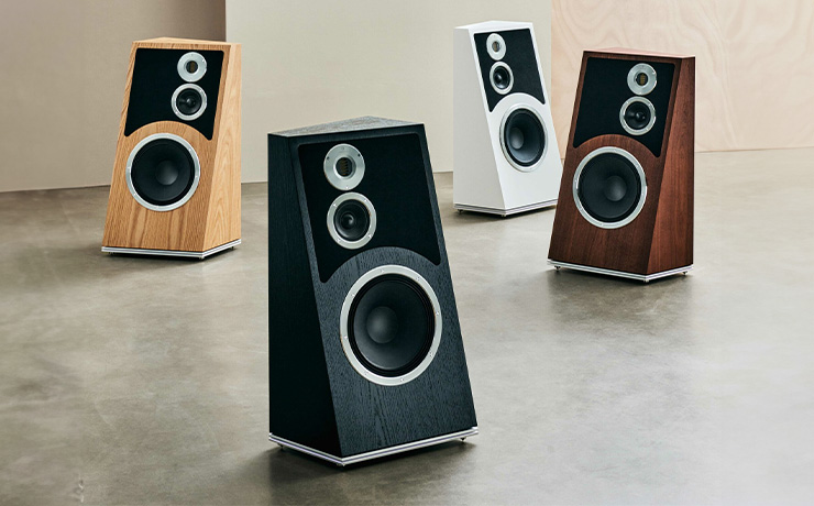 Four Audiovector Trapeze Ri speakers, one in each of the finishes