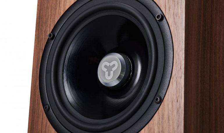 Image shows a close-up of a Cardea speaker