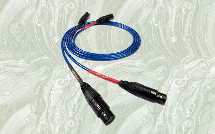 Nordost Blue Heaven Analogue Interconnect Cable on a green background