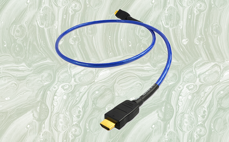 Nordost Blue Heaven HDMI Cable on a faded, green splodgy background.