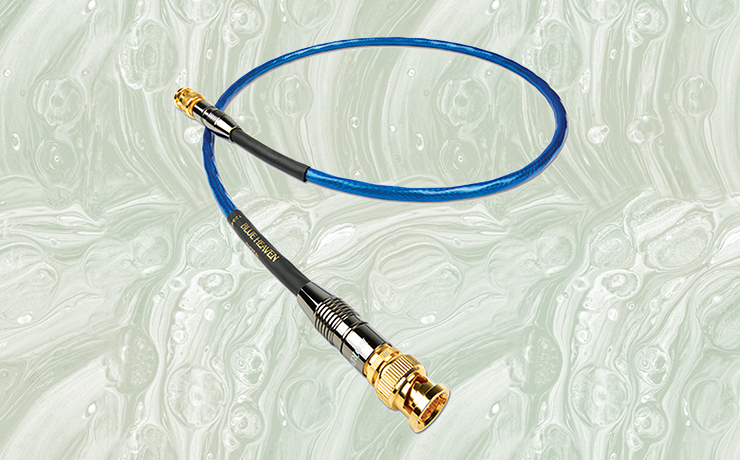 Nordost Blue Heaven Digital Cable (75ohm) on a faded green splodgy background.