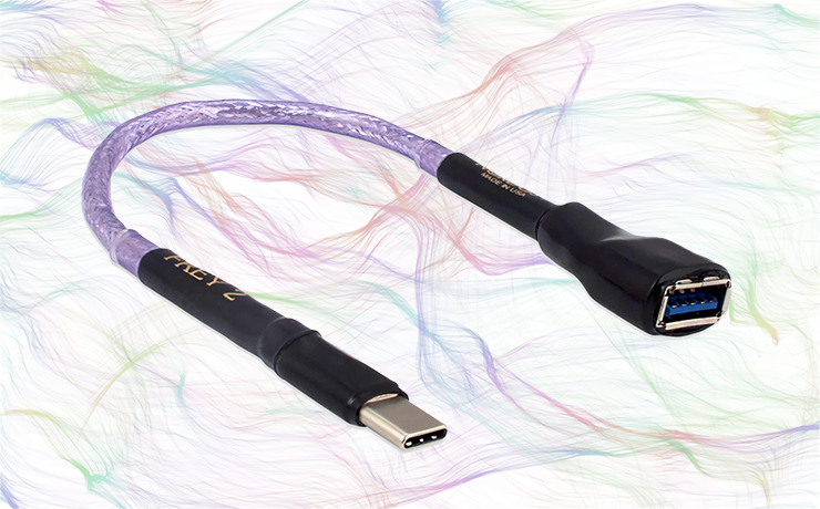Nordost Frey 2 USB C Adapter on a background of thin, colourful lines.