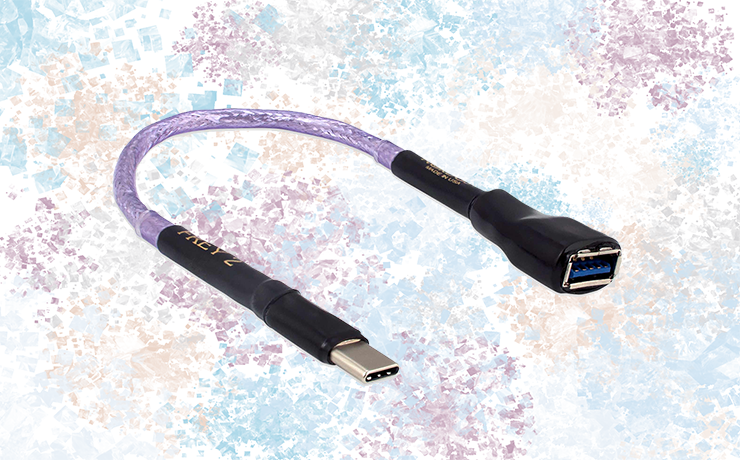 Nordost Frey 2 USB C Adapter on a muted, colourful, splodgy background