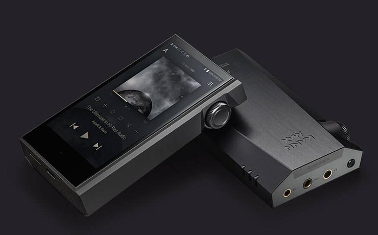 A pair of Astell & Kern Kann Max Music Players.  One face-up and one face-down.