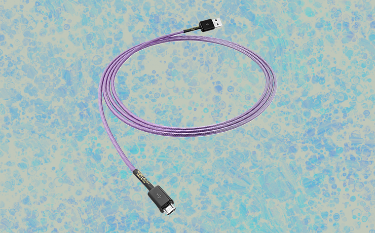 Nordost Purple Flare USB 2.0 Cable on a light and dark blue splodgy background.