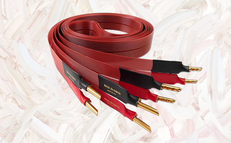 Nordost Red Dawn Speaker Cable on a painted cream and salmon background