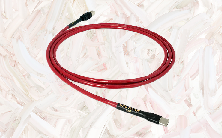 Nordost Red Dawn USB C Cable on a painted cream and salmon background