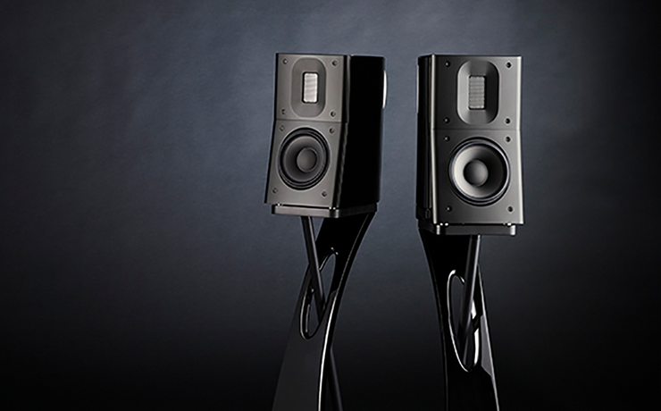 A pair of Raidho Acoustics TD1.2 Loudspeakers in black against a black background