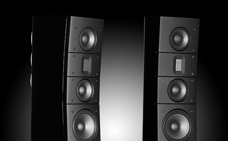 A pair of Raidho Acoustics TD3.8 Loudspeakers in black on a black background