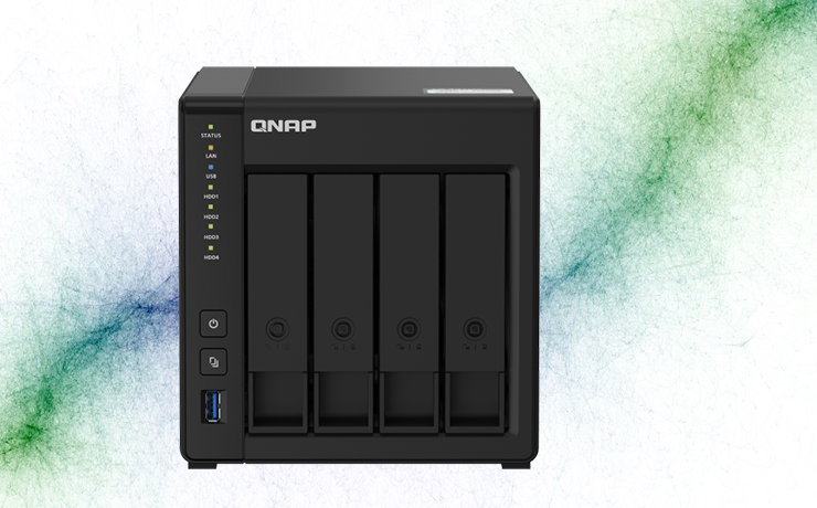 QNAP TS-451+ 4 Bay NAS.   There's a green and blue flared line running diagonally from one side of the image to the other.