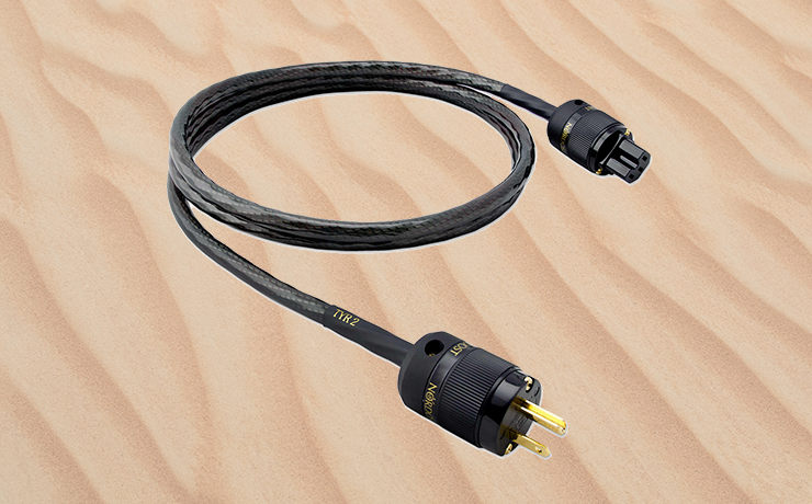 Nordost Tyr 2 Power Cable.  Background is rippled sand - pexels-aleksandar-pasaric-1527934
