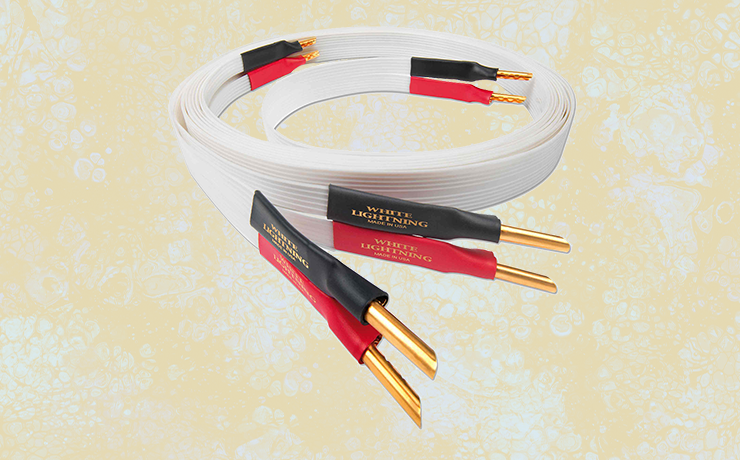 Nordost White Lightning Speaker Cable on a faded yellow splodgy background