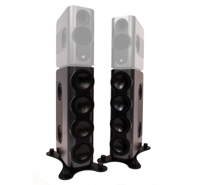 A pair of Kii Three BXT speakers in grey - the image shows the slower part of the speaker system with the upper section greyed out to show this product is just the lower BXT section.