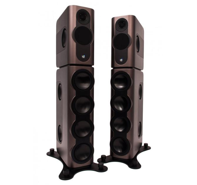 A pair of tall Kii speakers in a bronze colour