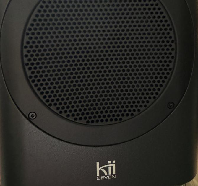 Close-up of the Kii Seven speaker in black