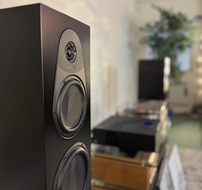 Linn 150 speaker - view of the top from the side with other audio equipment in the background