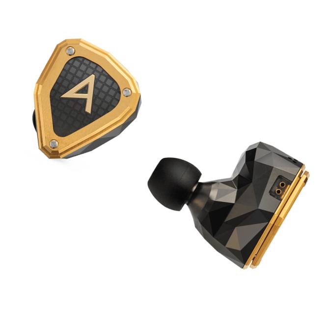 Astell & Kern Novus earphones showing one from the front which is black and gold with the "A" of Astell & kern and one from the side