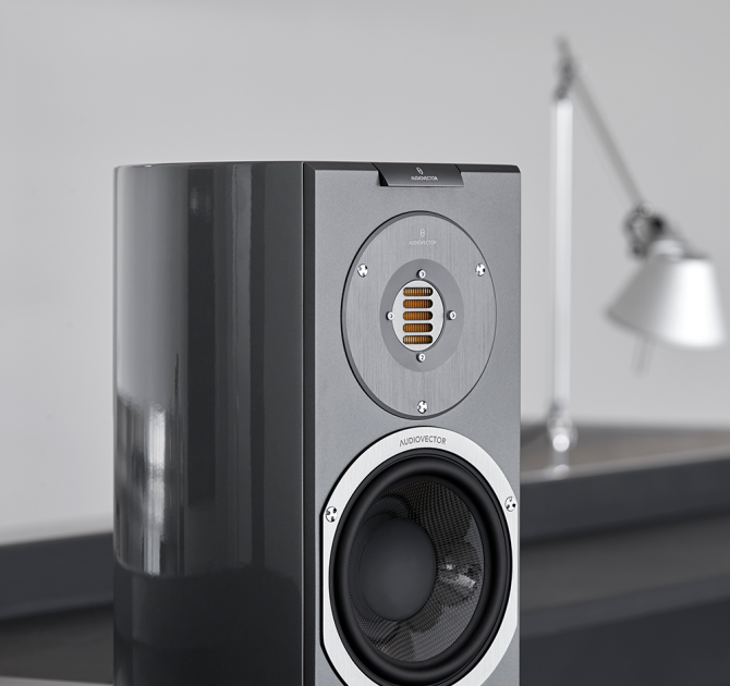 Audiovector R1 Avantgarde in custom grey with a lamp in the background