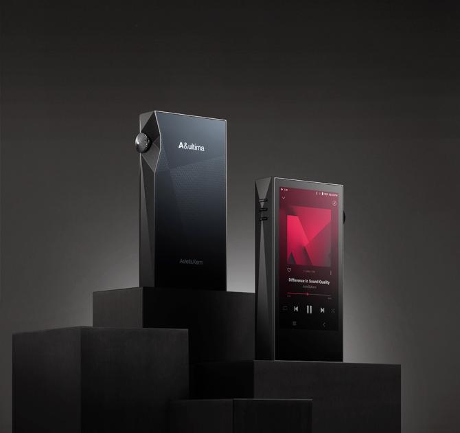 A pair of Astell & Kern A&ultima SP3000M Portable Music Players standing on a black display stand