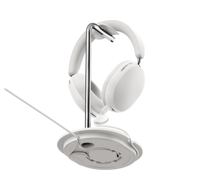 White Sonos Ace Headphones on the white stand viewed from underneath
