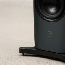 Linn 360 speaker in Triton - close-up of the bottom part showing the stand and the Linn logo
