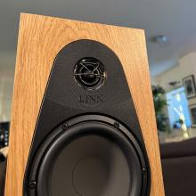 A pair of oak Linn 119 Loudspeakers in the ripcaster showroom