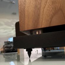 Linn 150 speaker in Walnut at ripcaster - close-up of the spike at the base of the stand