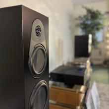 Linn 150 speaker - view of the top from the side with other audio equipment in the background