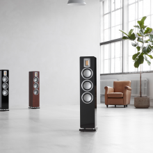 Audiovector QR5 - two black speakers and one dark walnut.