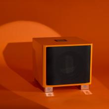 REL T/9x Special Edition Subwoofer in orange with grille on