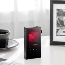 Astell & Kern A&ultima SP3000M Portable Music Player standing up on a table