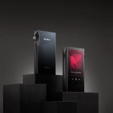 A pair of Astell & Kern A&ultima SP3000M Portable Music Players standing on a black display stand