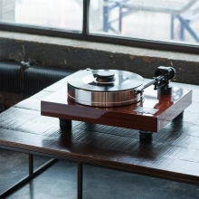 Project Xtension 10 (no cartridge) - Turntable on a low wooden table in an apartment.